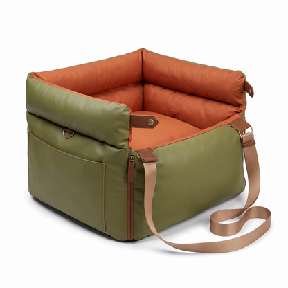 Premium leather look dog car seat travel bed in olive green and burnt orange, studio packshot
