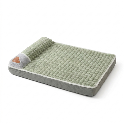 Sage green memory foam dog bed with removable washable cover on white background