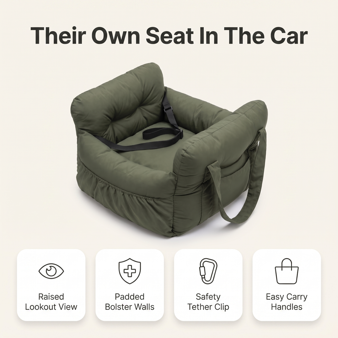 Dog car seat feature overview: raised lookout view, padded bolster walls, safety tether clip, easy carry handles