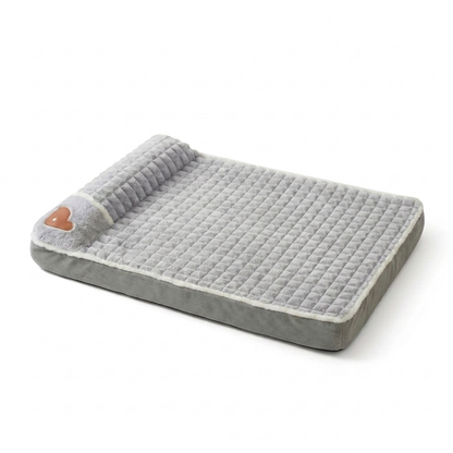 Grey memory foam dog bed with removable washable cover on white background