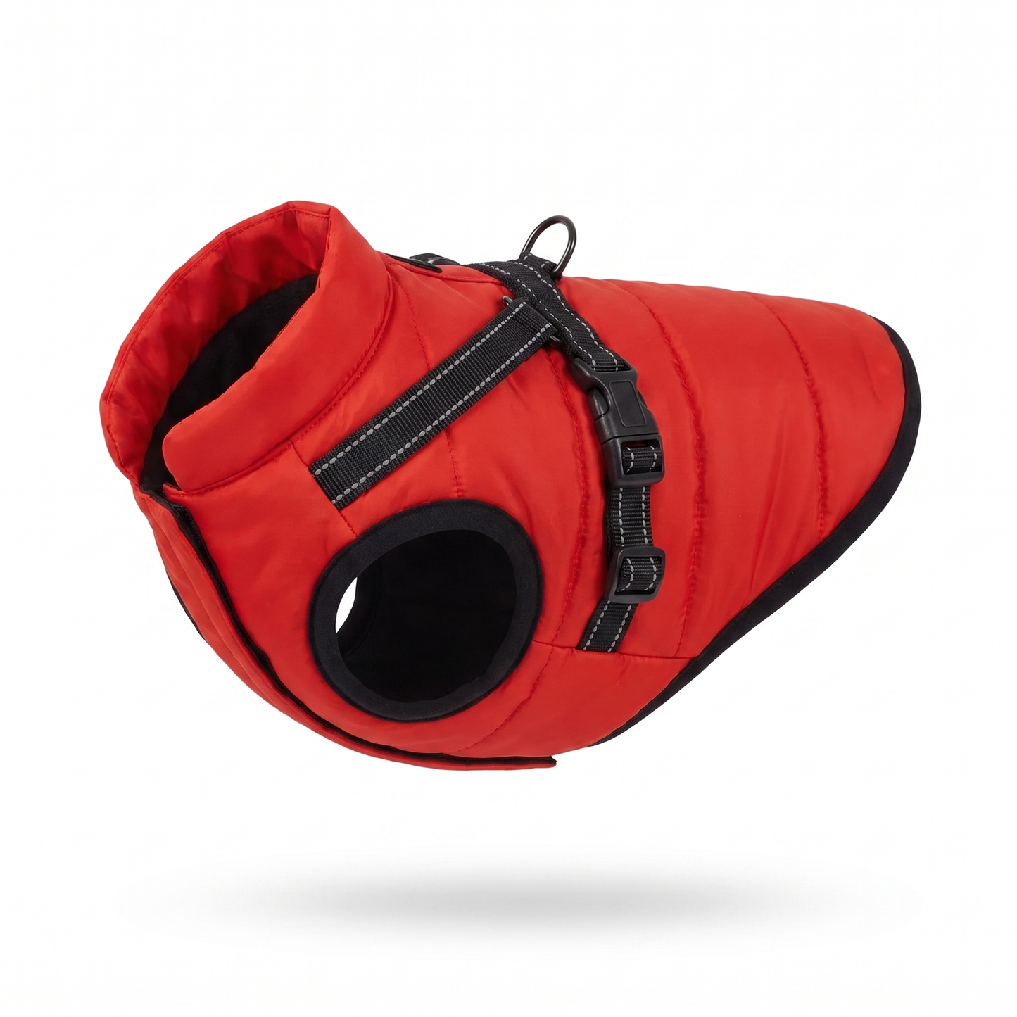 Red padded dog coat with integrated black harness, product view on white background