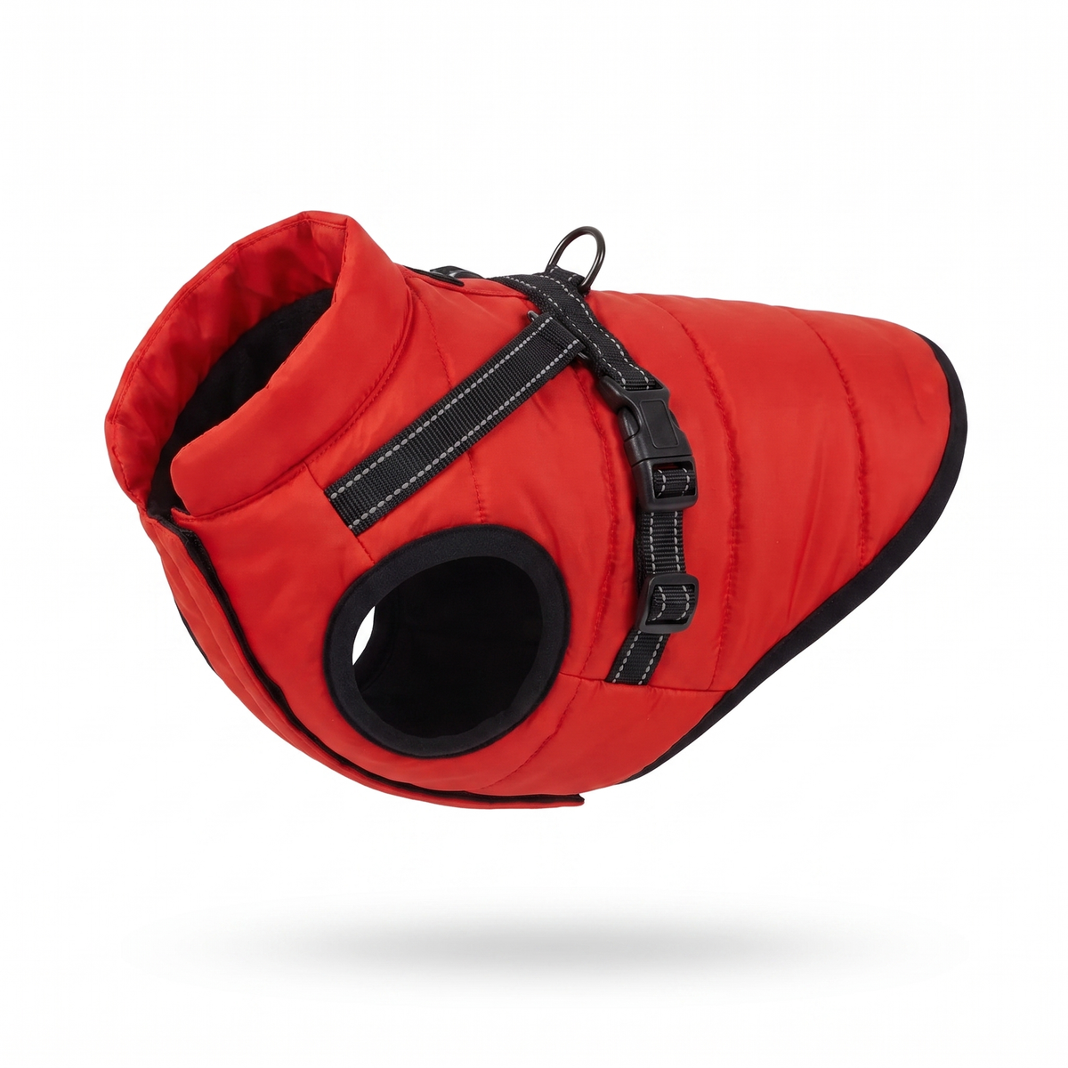 Red padded dog coat with integrated black harness, product view on white background