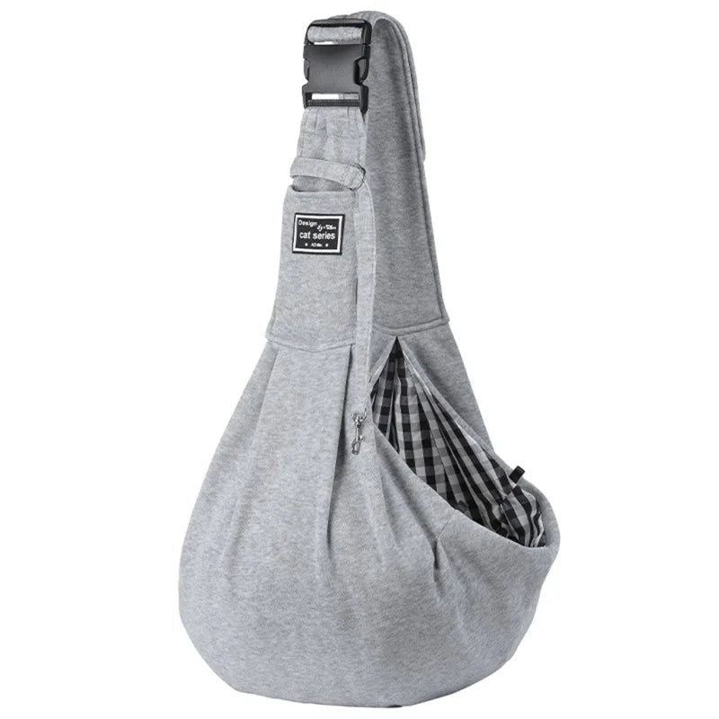 Grey padded pet sling carrier with checked lining