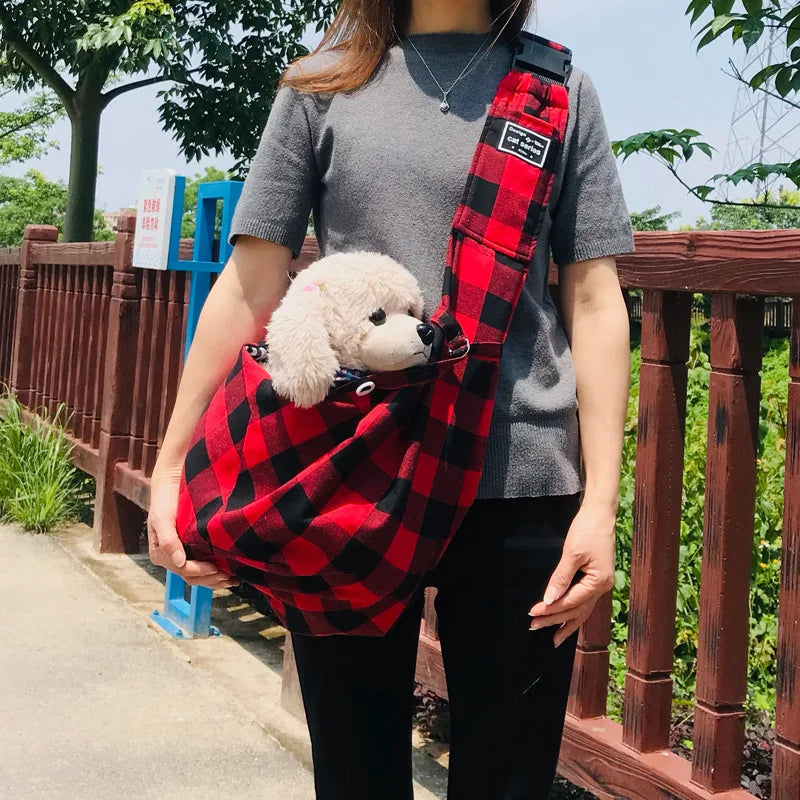 Padded pet sling carrier showing the soft checked lining