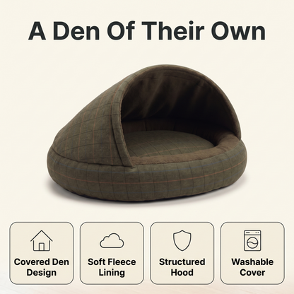Covered dog bed features: den design, soft fleece lining, structured hood, washable cover