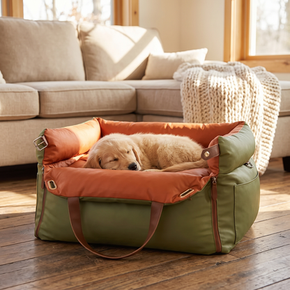 Dog car seat used as a cosy travel bed at home with a sleeping golden retriever puppy