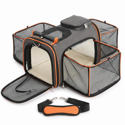 Expandable grey cat carrier with orange trim fully opened with shoulder sling strap, on white background