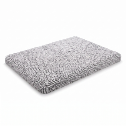 Grey memory foam noodle dog mat with washable removable cover on a white background