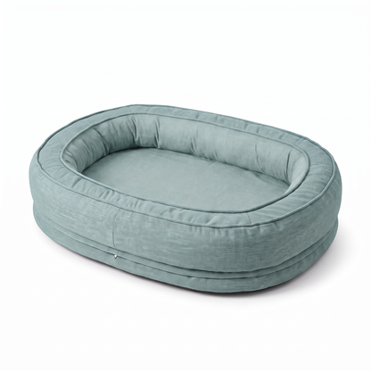 Teal donut dog bed with removable washable cover