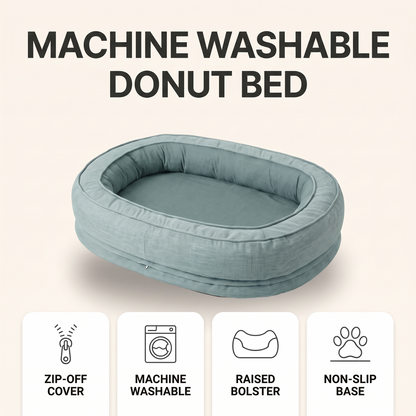 Machine washable donut dog bed features: zip-off cover, machine washable, raised bolster, non-slip base