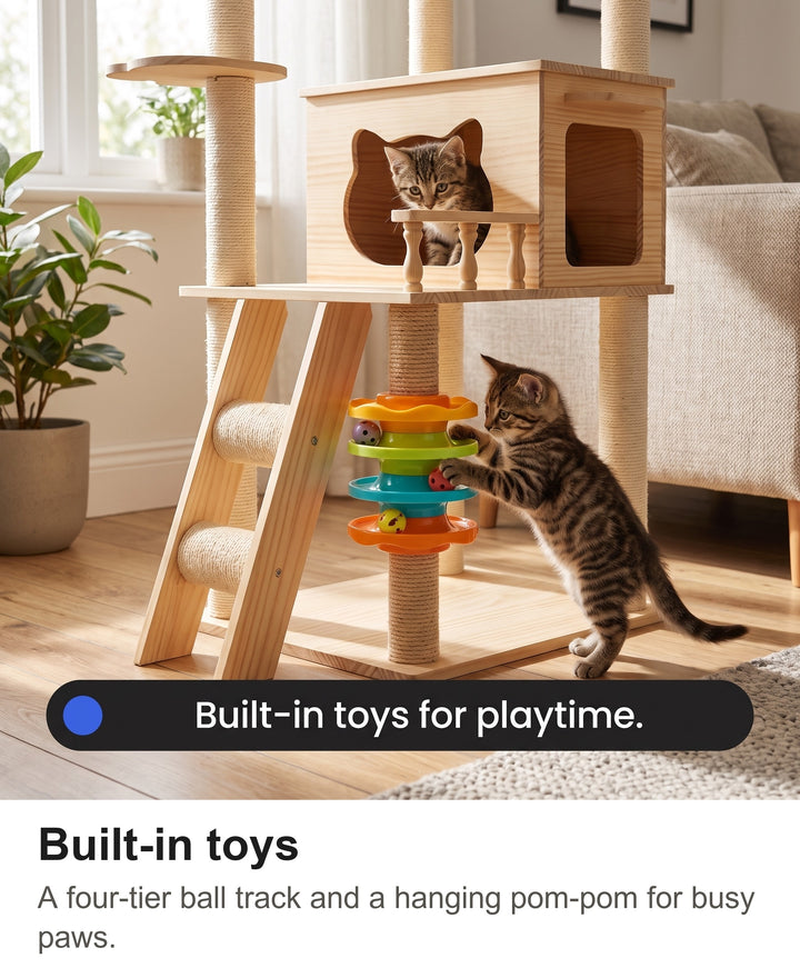 Kittens playing with the ball-track toy at the bottom of the cat tree