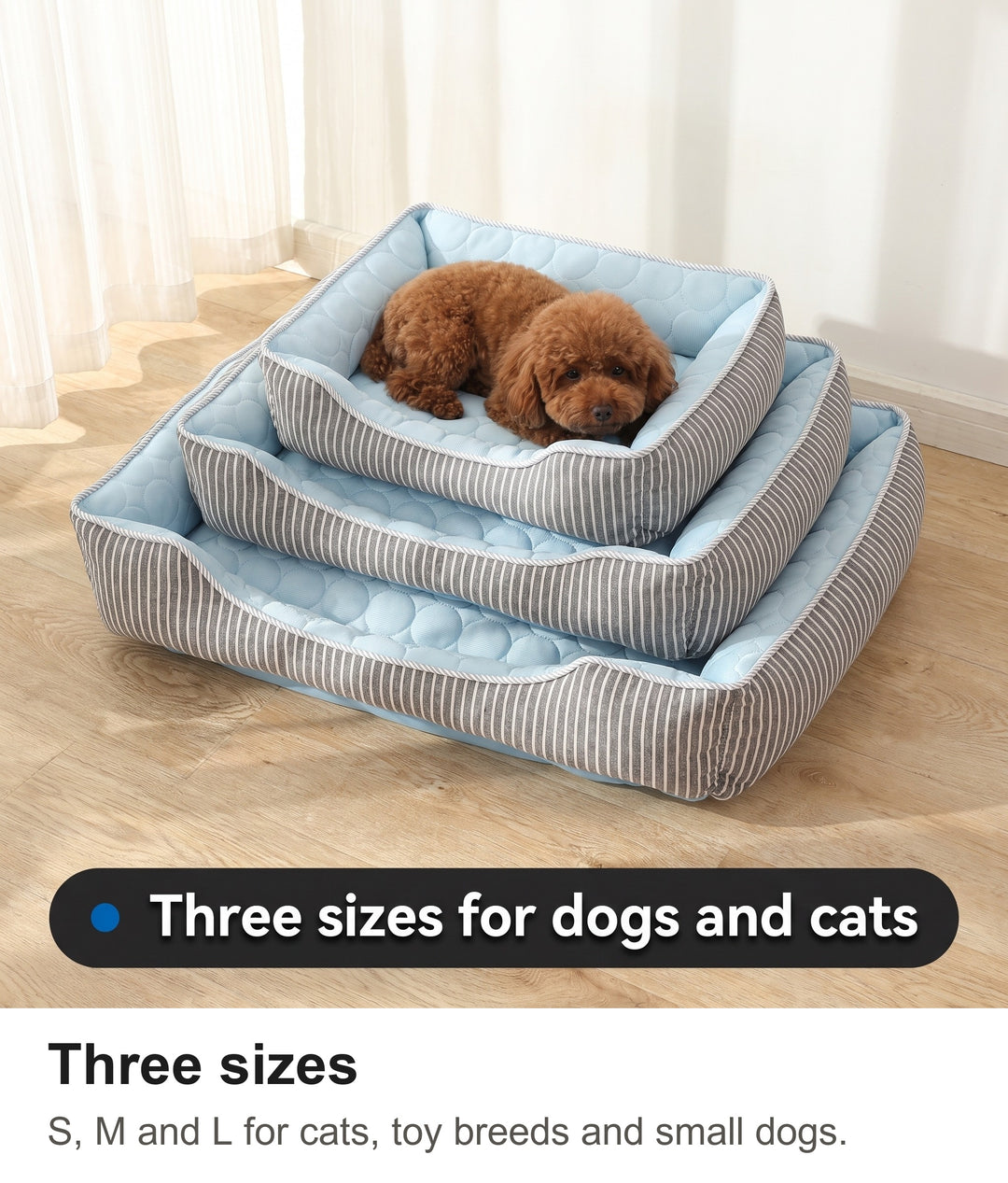 Three sizes of the cooling pet bed stacked with a poodle in the top bed