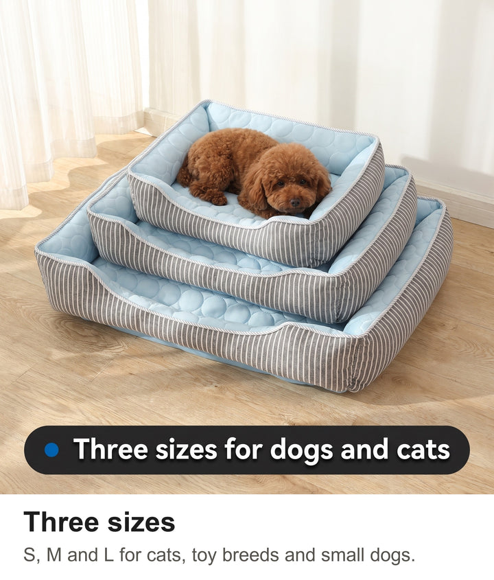 Three sizes of the cooling pet bed stacked with a poodle in the top bed