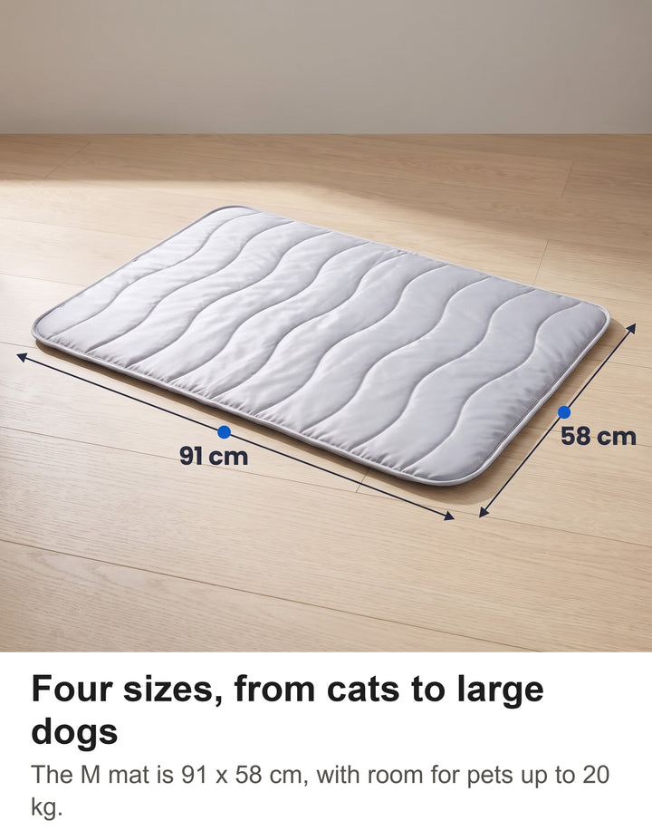 Ash grey cooling mat in size M with its size marked: 91 cm by 58 cm