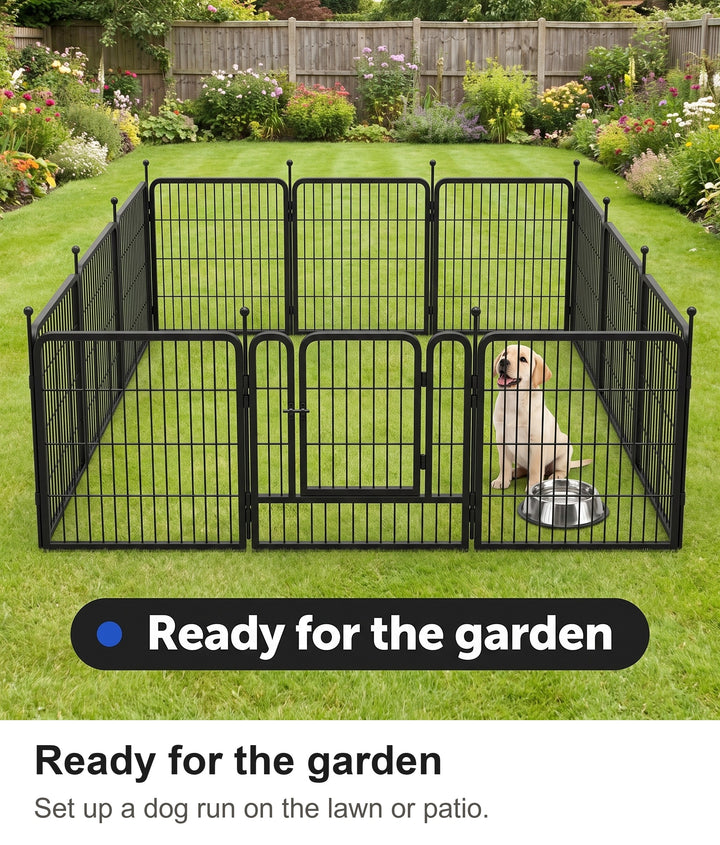 Labrador puppy inside the metal dog run set out on a garden lawn