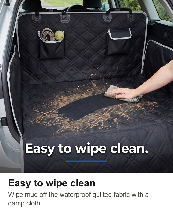Wiping mud off the quilted dog boot liner with a damp cloth