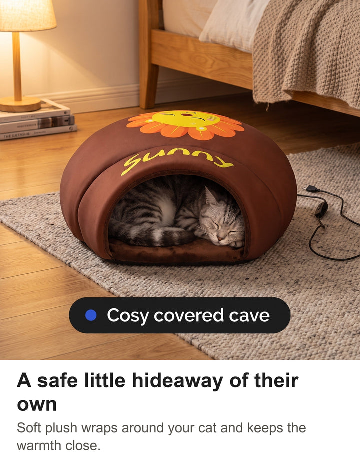 Silver tabby cat curled up inside a brown cat cave bed seen through the arched entrance