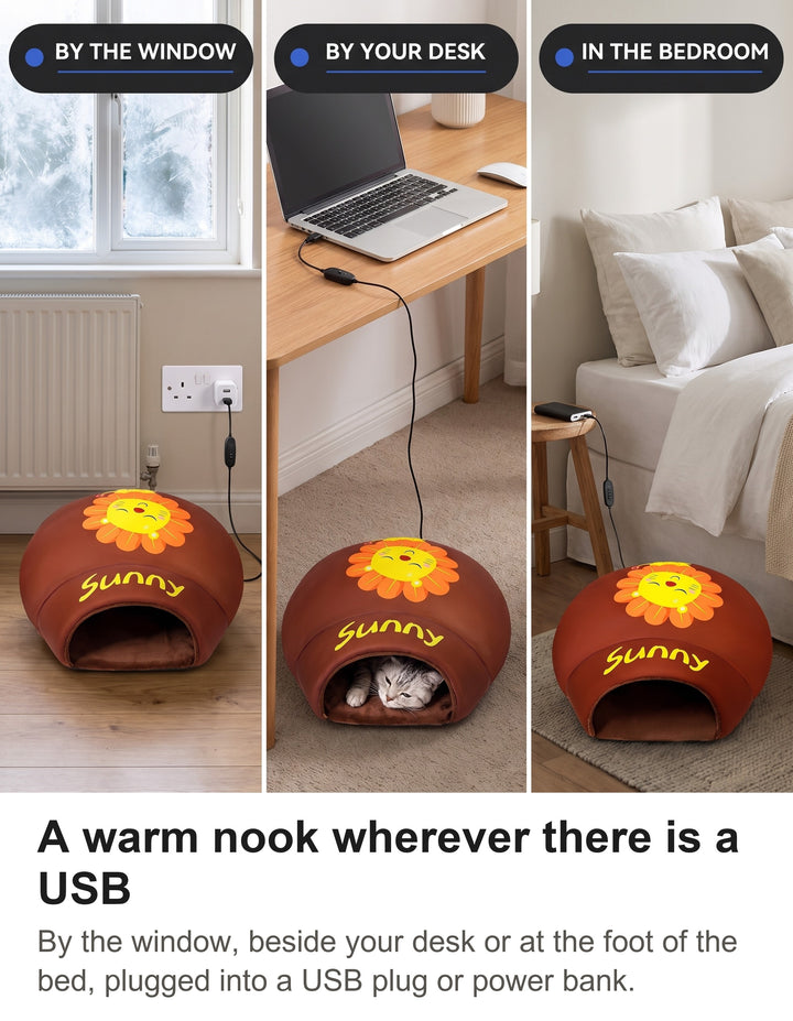 Heated cat cave by a window, beside a laptop desk and in a bedroom