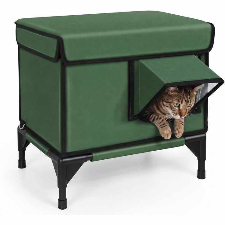 Tabby cat peeking out of the green insulated outdoor cat house on a raised steel frame