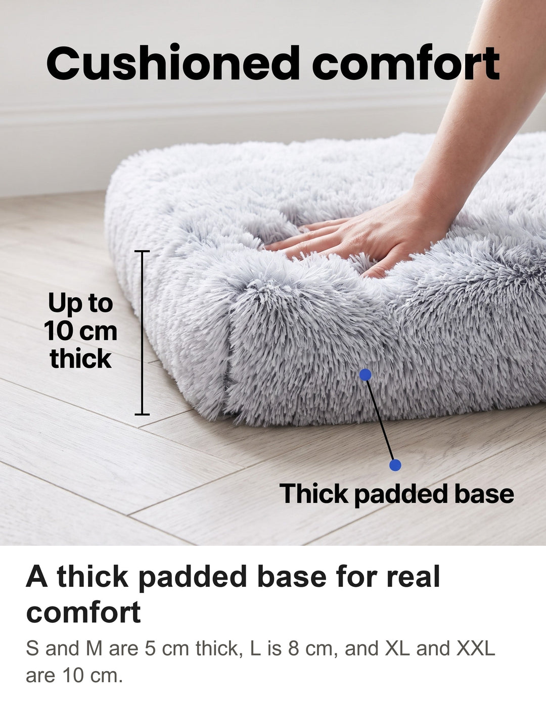 Cutaway corner of the dog crate bed showing the thick padded base up to 10 cm thick