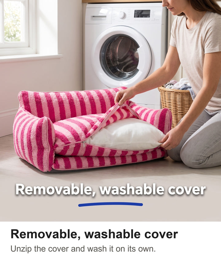 Woman unzipping the removable cover of the striped dog sofa in a utility room