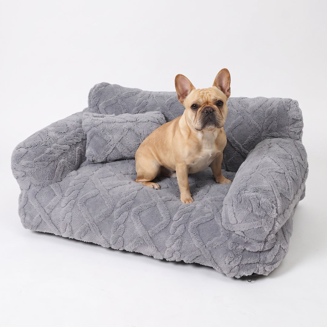 French bulldog sitting on the light grey dog sofa bed with backrest and pillow