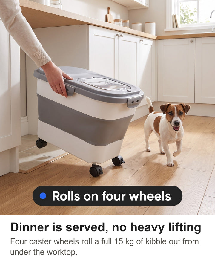 Grey dog food container rolling on four caster wheels out from under a worktop