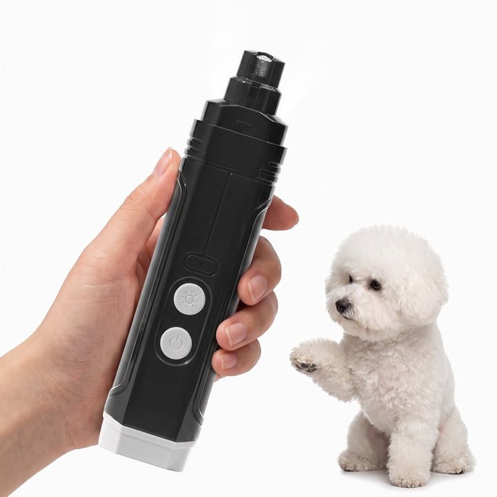 Black electric dog nail grinder with LED light filing a Bichon claw