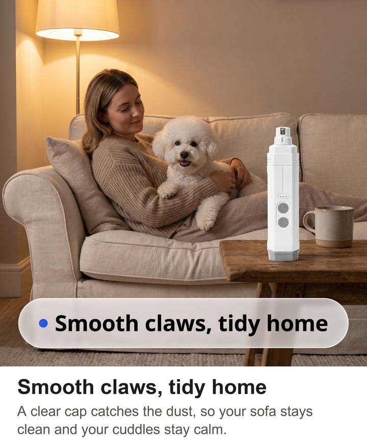 Woman cuddling a small dog on a sofa after a nail trim, with the nail grinder on the table