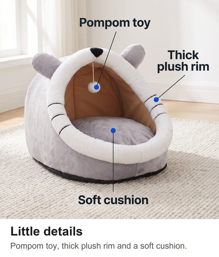 Cat igloo bed with pompom toy, thick plush rim and soft cushion labelled