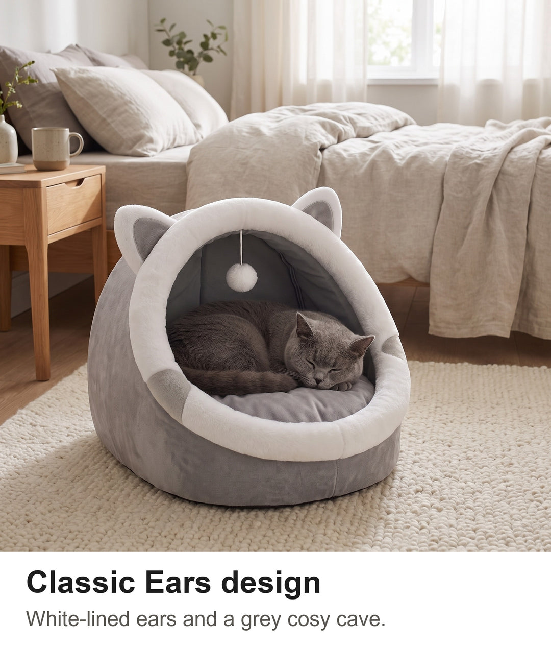 Grey cat asleep in the Classic Ears cat igloo bed in a bedroom