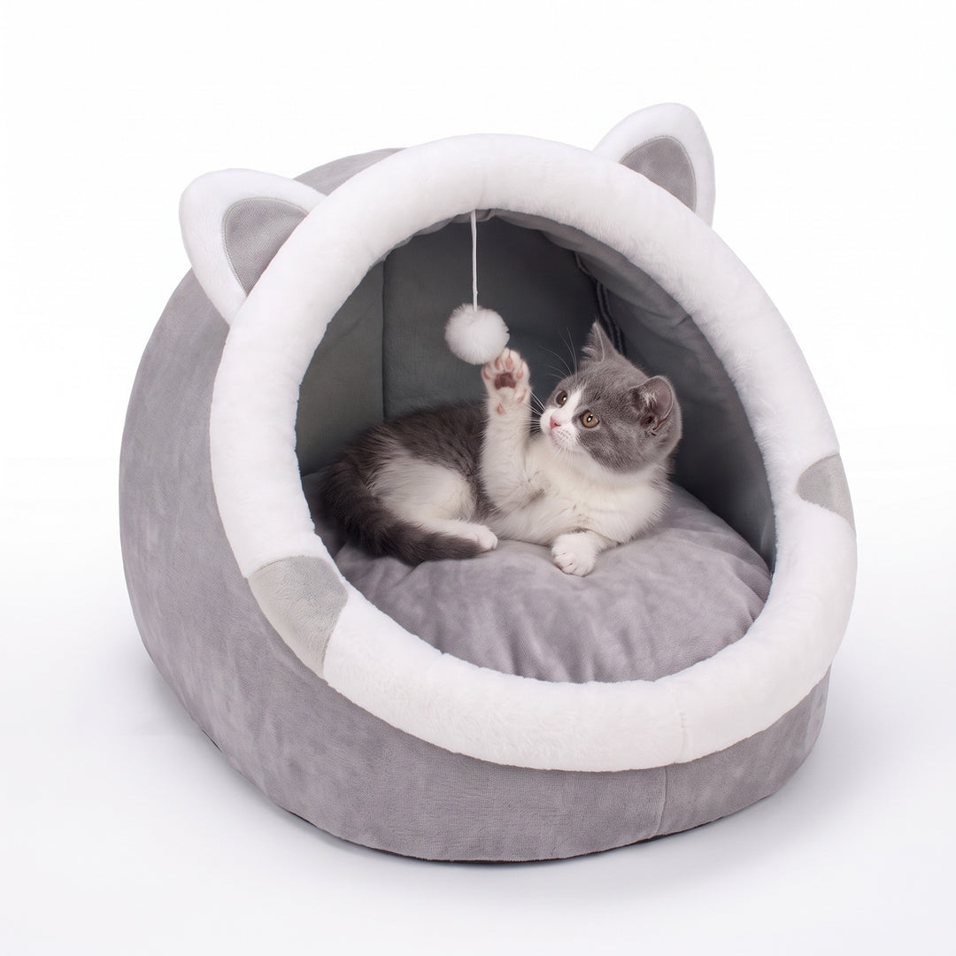 Classic Ears cat igloo bed with white-lined ears and pompom toy, kitten inside