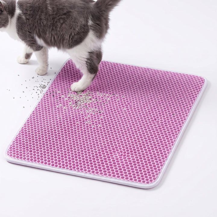 Pink double layer cat litter mat with a cat stepping off it