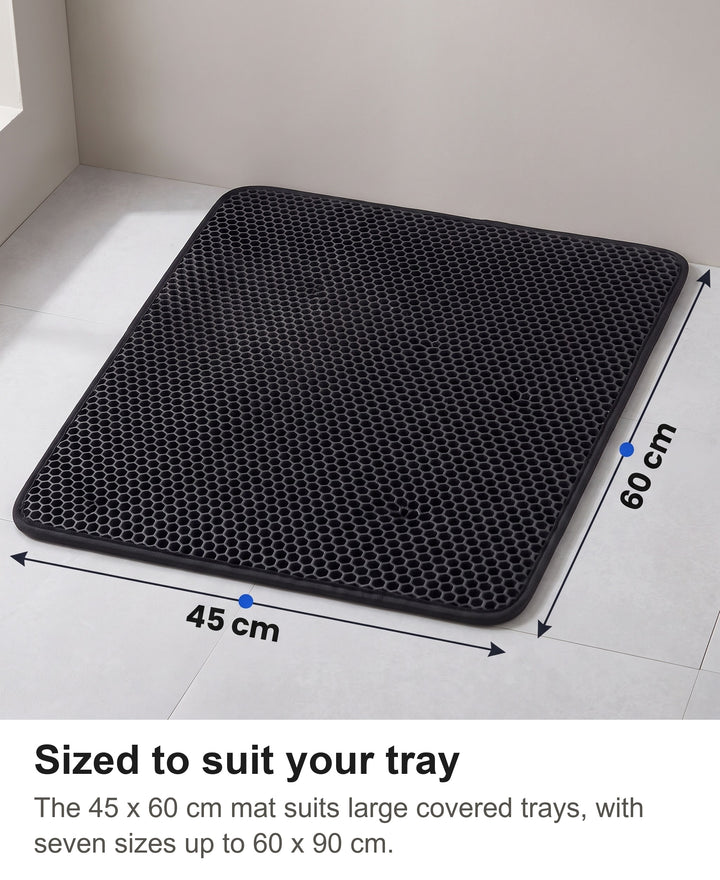 Black honeycomb cat litter mat in size 45 by 60 cm with its size marked