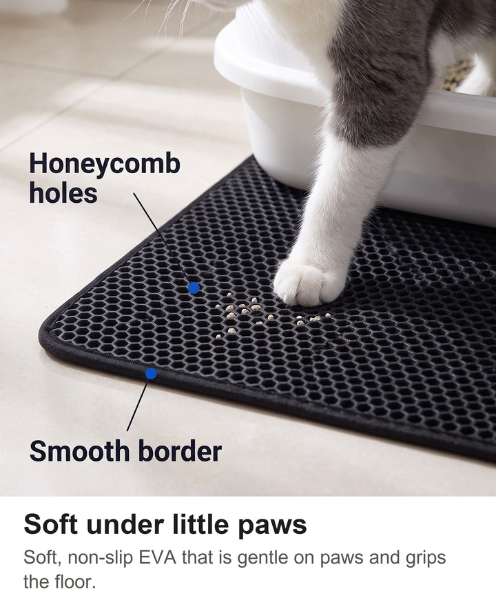 Close-up of a cat paw stepping onto the soft honeycomb litter mat