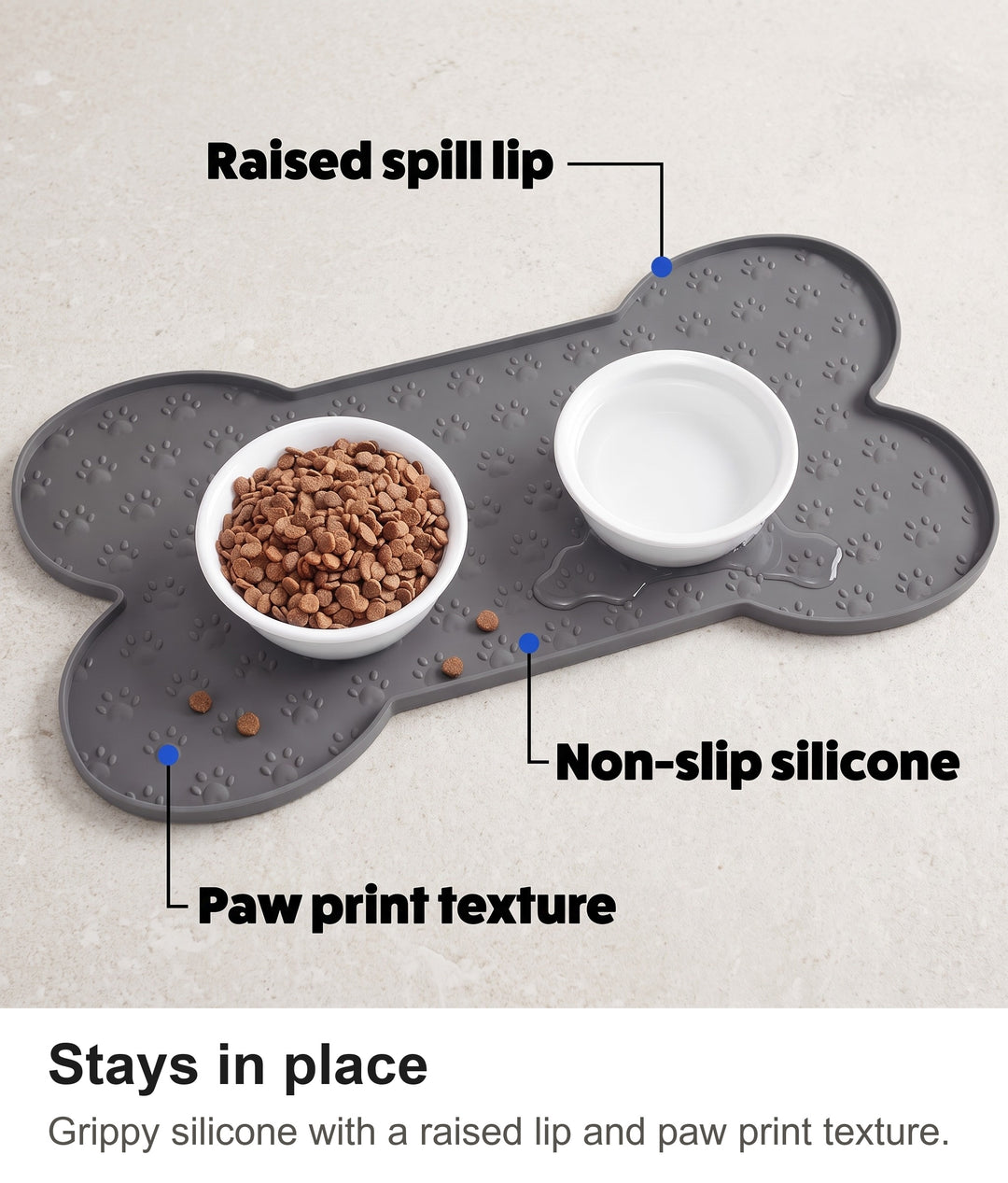 Silicone dog bowl mat with raised spill lip, non-slip silicone and paw print texture labelled