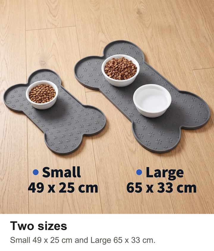 Small and large grey silicone food mats side by side with their sizes