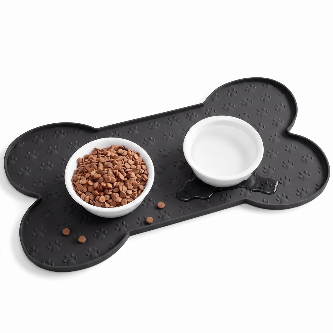 Black silicone dog food mat with raised edge and two bowls