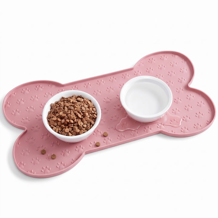Pink silicone dog food mat with raised edge and two bowls