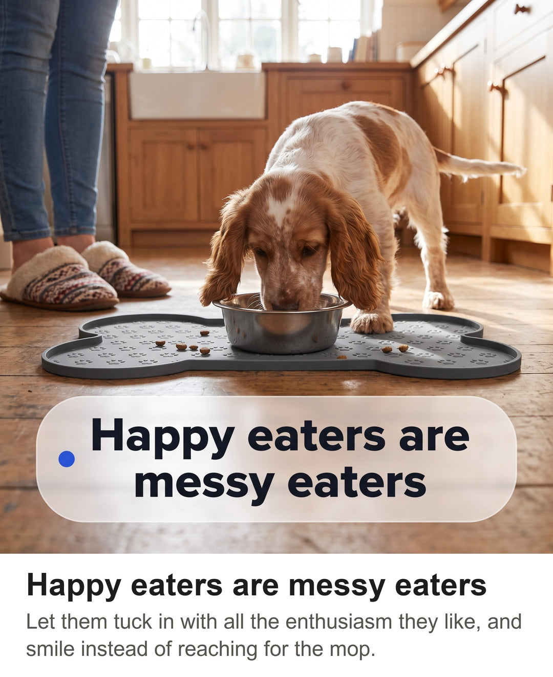 Cocker Spaniel puppy eating enthusiastically from a bowl on the grey silicone food mat