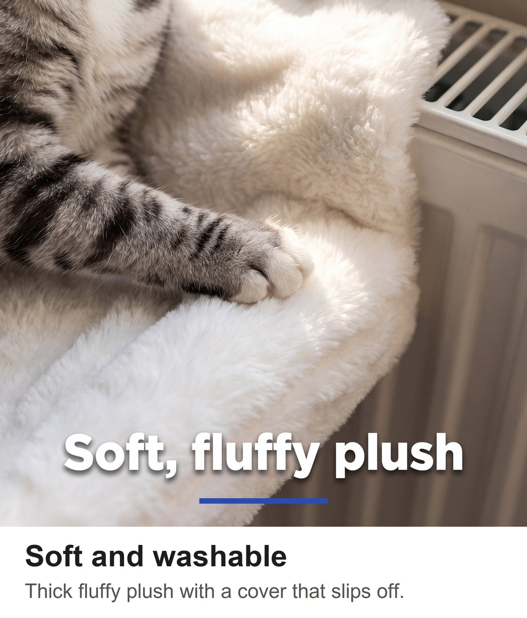 Close-up of a cat paw resting on the thick fluffy plush of the radiator hammock