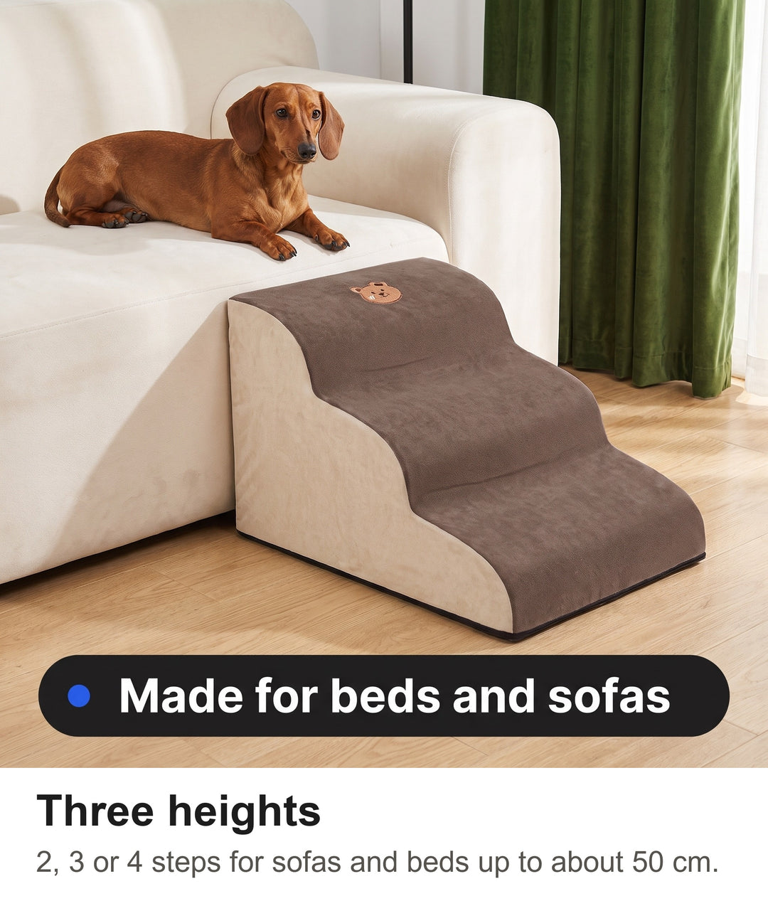 Dachshund resting on a sofa next to the brown foam dog stairs