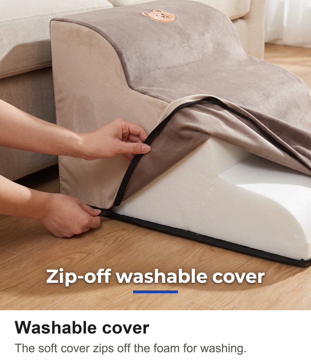 Unzipping the removable washable cover of the dog stairs