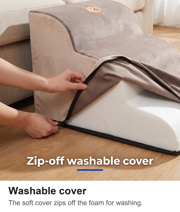 Unzipping the removable washable cover of the dog stairs
