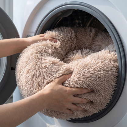 b5 easy care: the whole bed being pushed into an open front-loading washing machine drum, illustrating "machine washable